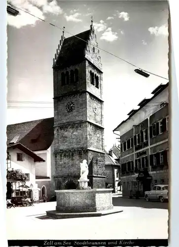 Zell am See, Stadtbrunnen und Kirche -347582