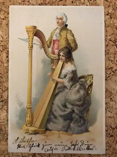 Frau spielt Harfe - mit kleinen Perlen bestzt -189242