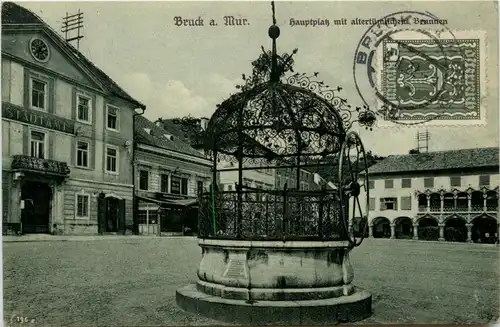 Bruck a.d. Mur, Hauptplatz mit altertümlichen Brunnen -323216