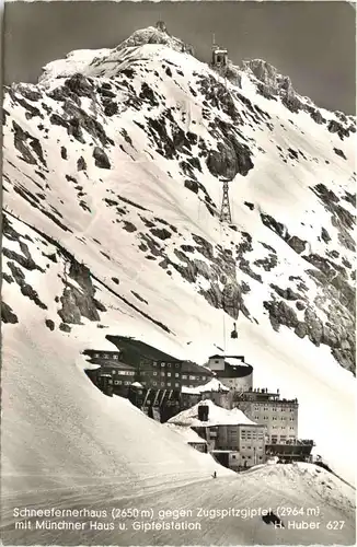 Schneefernerhaus gegen Zugspitzgipfel -552208