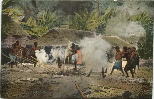 Deutsch Neu Guinea - Eingeborene beim Kuchen Backen -712386