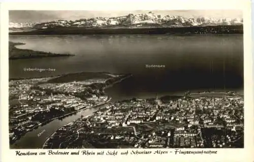 Konstanz am Bodensee und Rhein mit Sicht auf Schweizer Alpen -555424