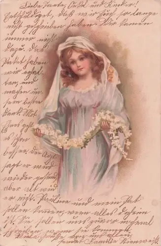 ein junges Mädchen in einem hellen Kleid mit einem Blumengirlandenschmuck -804338