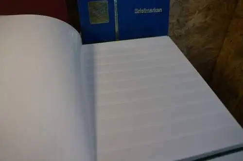 4 Einsteckbücher mit je 32 weißen Seiten verschiedene Farben (28249)