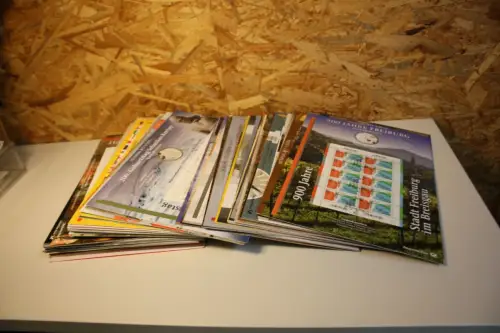 100 Numisblätter ohne Münzen (33444)