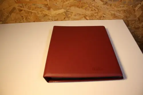 2 Lindner Alben grün + rot mit 60 1er Hüllen (33567)