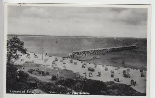 (104175) AK Ostseebad Scharbeutz, Strand mit Landungsbrücke, 1934