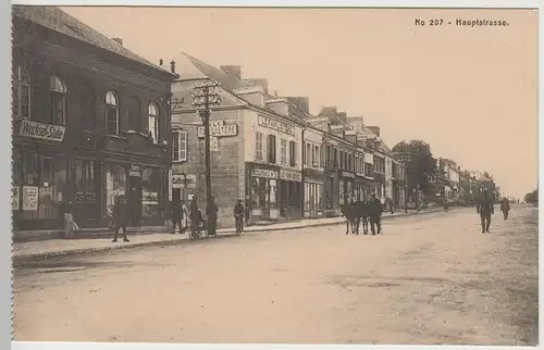(83022) AK 1.WK Hauptstraße in einem Ort, deutsche Geschäfte 1914-18