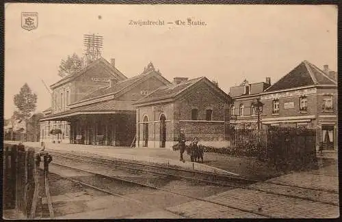 [Echtfotokarte schwarz/weiß] Zwijndrecht in Belgien, De Statie (der Bahnhof) - Feldpostkarte. 