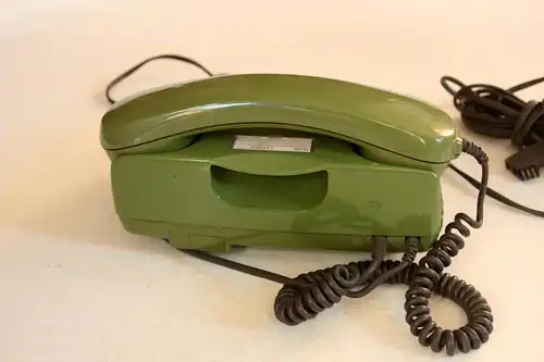 Vintage grünes Telefon mit Wählscheibe aus den 1970ern, voll funktionsfähig