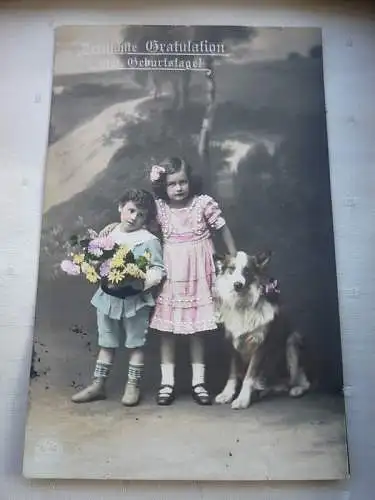 [Echtfotokarte farbig] AK Geburtstag Kinderpaar Junge und Mädchen mit Hund und Blumenkorb, Herzliche Gratulation zum Geburtstage, R&K L Nr. 4849/1, Karte ist beschriftet, Briefmarke Dt. Reich Nr. 85 5 Pfennig. 