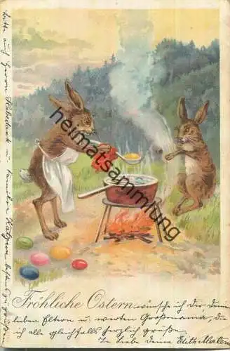 Fröhliche Ostern - Hasen beim Eierfärben