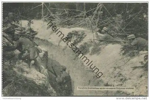 Feindliche Drahtverhaue werden von unseren Feldgrauen erstürmt - Feldpost gel. 1917