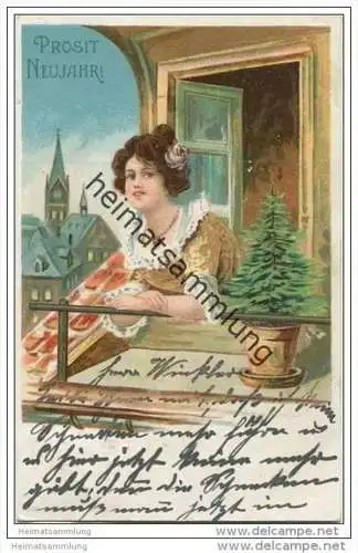 Neujahr - Frau schaut aus einem Fenster