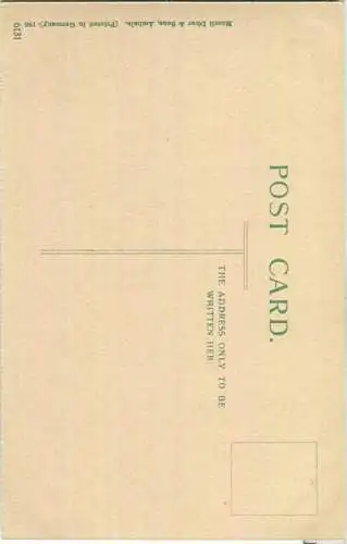 India - Native drawing water from well on pulley