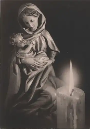 Mutter mit Kind hinter einer Kerze - ca. 1960