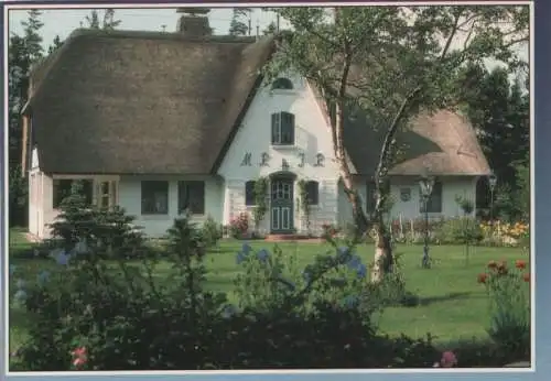 unbekannter Ort - Haus mit Reetdach