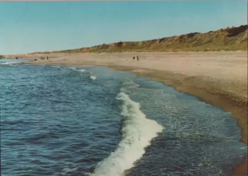 Spaziergänger am Meeresstrand - ca. 1980