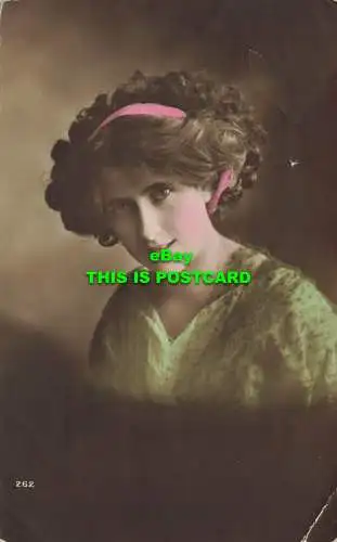 R604898 Frau mit rosa Band im Haar. Porträt. 1918