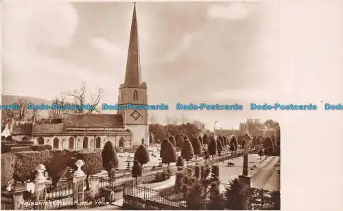 R130603 Painswick Kirche und Eiben