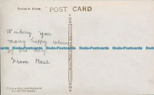 R150584 alte Postkarte. Frau mit Blumen. Drehbar. RP