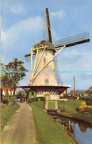 R171985 Hollandse Molen. Holländische Windmühle. Ronde stenen watermolen met zwichtstell