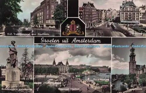 R694793 Groeten uit Amsterdam. Damrak. Hauptbahnhof. Rembrandt Standbeeld. R