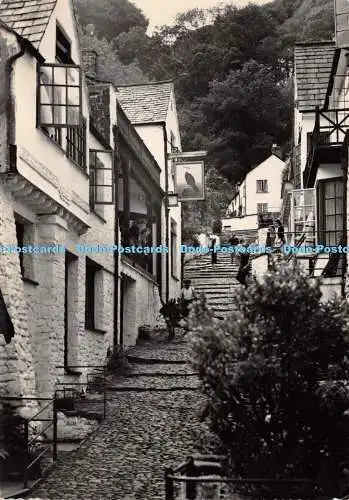 D036574 Clovelly. Schau nicht auf den Hügel und grummle. klettern. High Street. Pho
