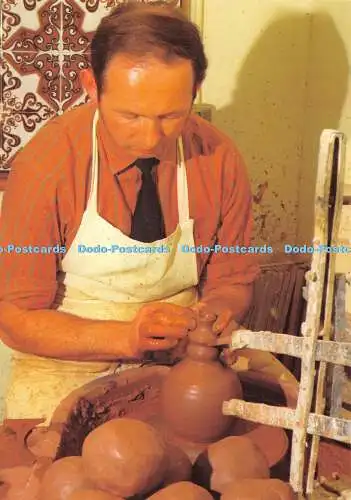 Trikot D046973. C.I. The Jersey Pottery. Gorey. Craft Potter at Work. Jarrold