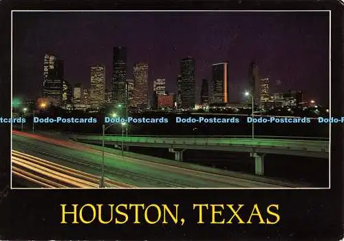 D101020 Texas. Houston. Night Skyline. Die Texas Postkarte. W. C. Ging