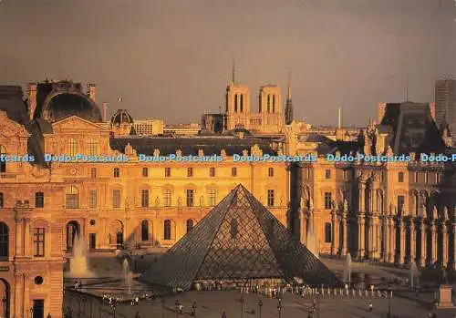 D164393 La Pyramide et la Cathedrale Notre Dame. Depuis Les Troits du Louvre. Re