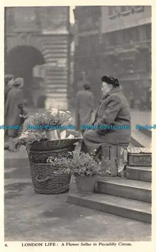 R125833 London Life. Ein Blumenverkäufer im Piccadilly Circus. Charles Skilton