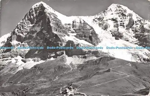 R238224 Kleine Scheidegg Eiger und Mönch Ernst Schudel Foto Haus Grindelwald Fa