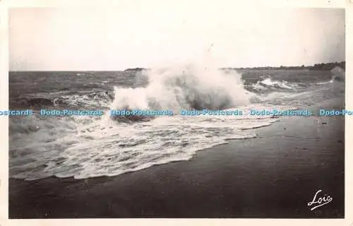 R325986 Cote D Emeraude Parame La Digue par tempete dans le lointain Rochebonne