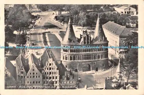 R338868 Lübeck Blick vom Petrikirchturm auf des Holstentor Schoning RP