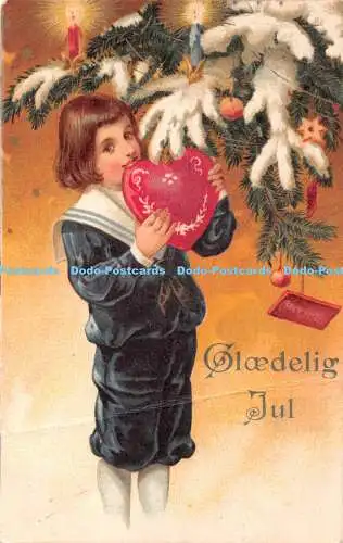 R337651 Glaedelig Jul Das Mädchen isst Lebkuchen an der Tanne S 502