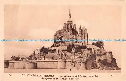 R404459 10 Le Mont Saint Michel Les Remparts et lAbbaye cote Est Ramparts of the