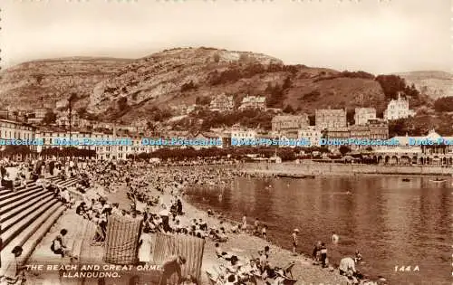 R446710 Llandudno The Beach and Great Orme RP 1958
