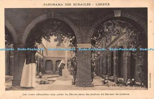 R490985 Lisieux Panorama des Miracles Les roses effeuillees aux pieds du Christ