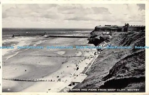 R552834 Whitby The Sands and Piers from West Cliff 1958
