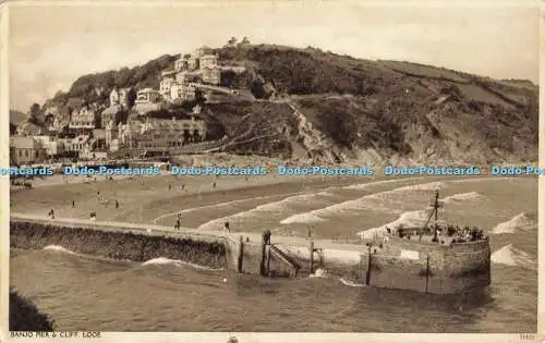 R559463 Looe Banjo Pier und Klippe Postkarte