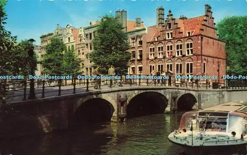 R575936 Amsterdam C O Z Voorburgwal met Huis and drive Grachten Krüger 1955