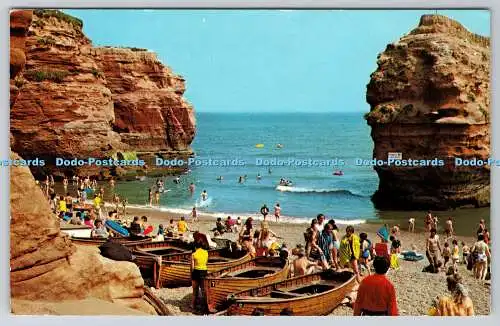 R734347 Devon Ladram Bay Ein Blick auf den Strand und die roten Felsen N P O Atlantic Tradin