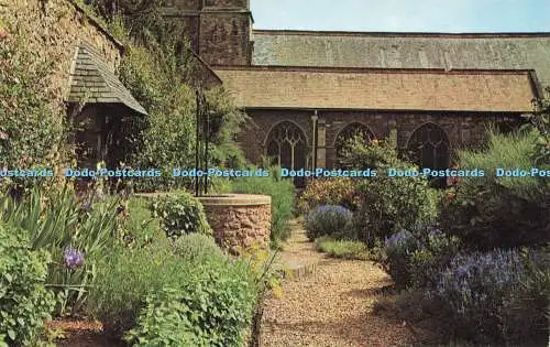 R583148 Dunster Pfarrkirche Wunschbrunnen und Rosengarten Plastichrome H A Summ