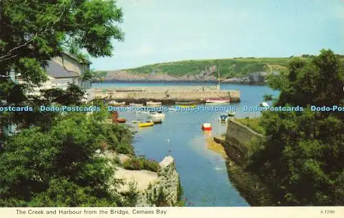 R581861 Cemaes Bay Der Bach und Hafen von der Brücke E T W Dennis Photocolou