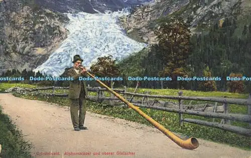 R621360 Grindelwald Alphornblaser und oberer Gletscher R Schudel Photo Suisse