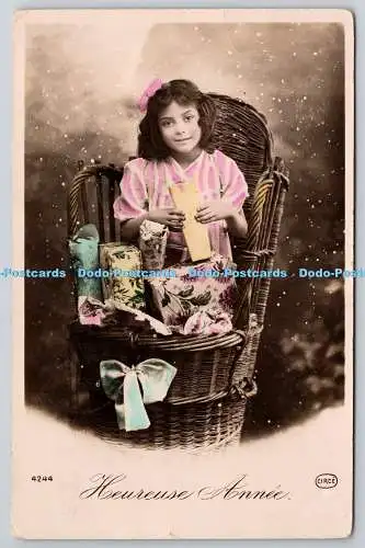 R759271 Heureuse Annee Mädchen mit Geschenken Postkarte 1909