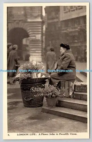 R765168 London Life A Flower Seller in Piccadilly Circus Charles Skilton C Degen