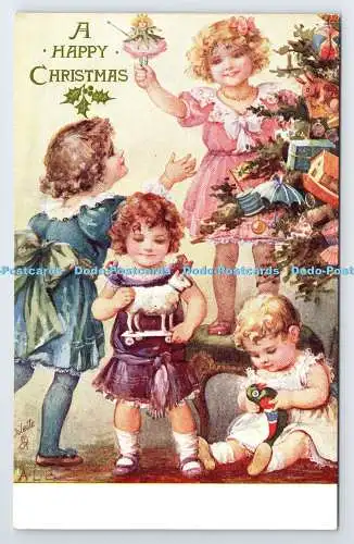 R778884 A Happy Christmas Children at the Christmas Tree Tuck Oilette 8437