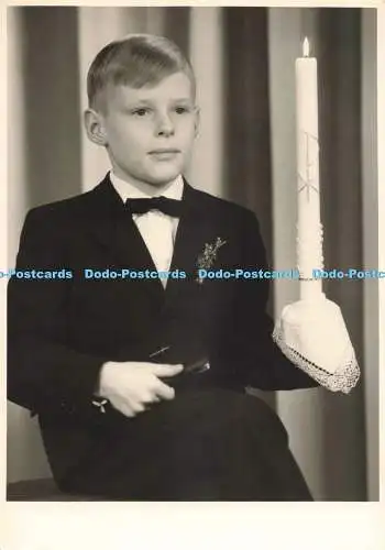 D272052 Young Boy Keep Candle